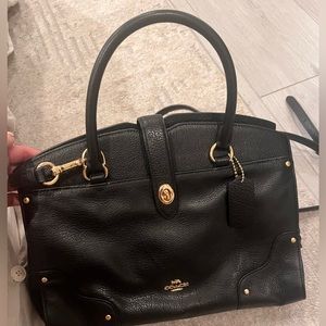 Black Coach handbag, multiple pockets, very classy and functional